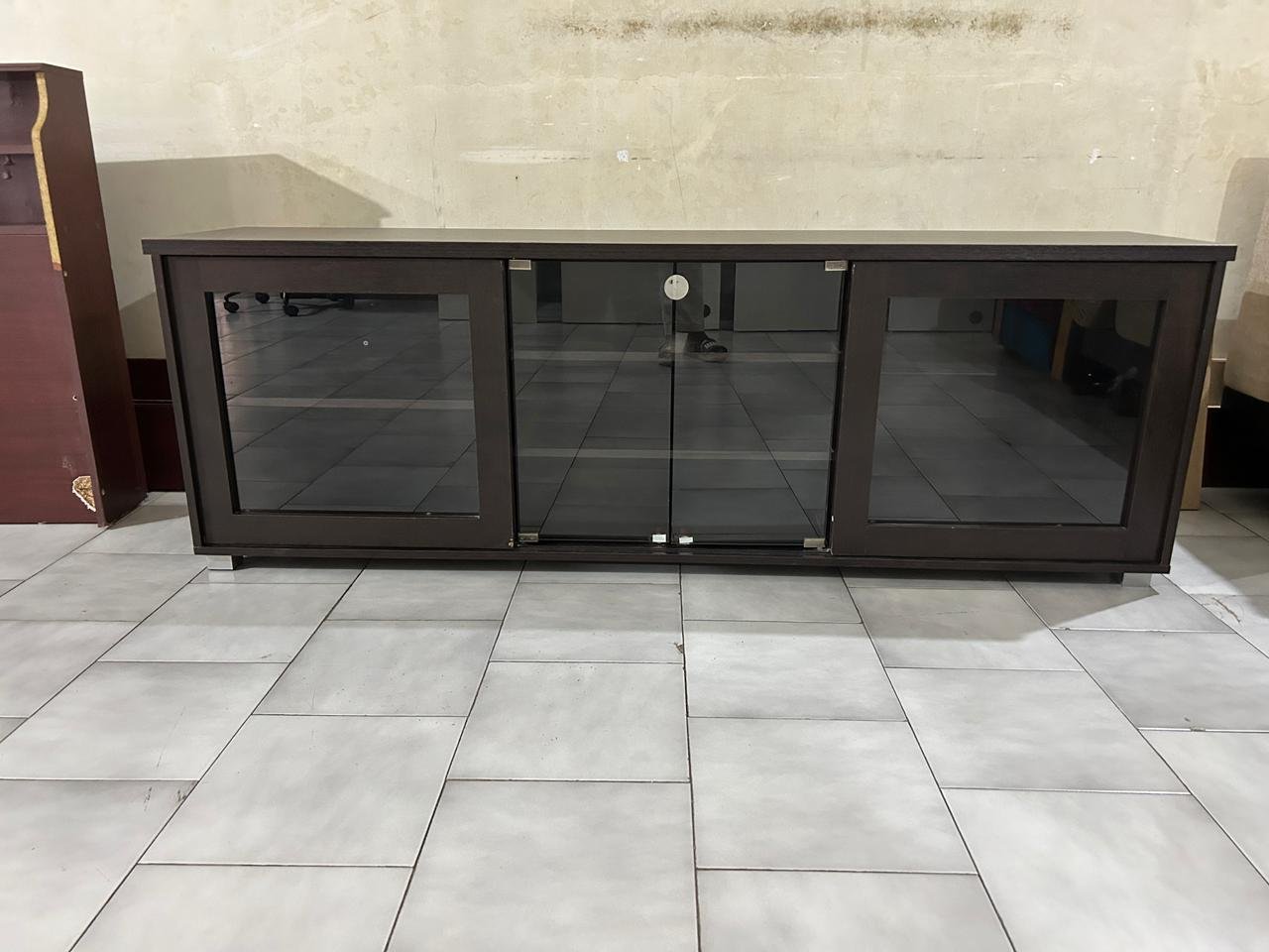 Like new Wooden Tv unit with storage and sliding door